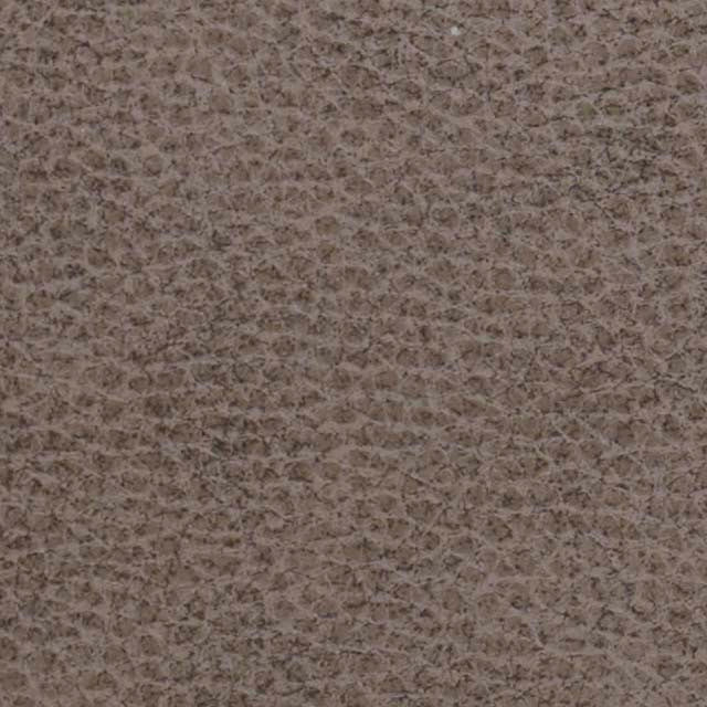 Close-up of the textured brown leather on the Golden Tech PR525 Cloud+ Recliner With Lift Assist & Twilight, featuring a pattern of small, raised bumps and fine lines typical of luxury power lift recliners.